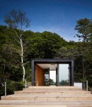 Dark-Cladded Mountain House Camouflaged between Trees (13)